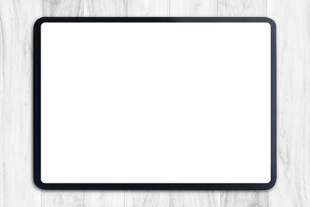 Digital tablet mock up on white wood table with Clipping path on tablet blank screen easy replace...