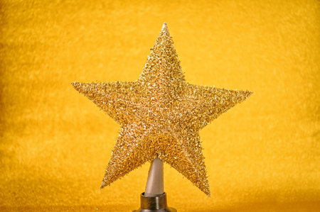 Christmas decoration, Golden Christmas star ball on gold backgrounds