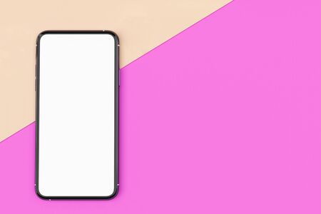 Top view smartphone empty screen template on pastel workspace table with earphone and copy spaceの写真素材