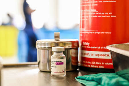 Thailand - June 7 , 2021 Close up of AstraZeneca Vaccine vials bottles for can help stop pandemic ,COVID-19 vaccines can help reduce the transmission of the new coronavirus from person to personのeditorial素材