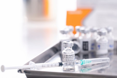 Thailand - AUG 27 , 2021 Close up of Pfizer -BioNTech vaccine vials bottles for stop pandemic ,COVID-19 vaccines can help reduce the transmission of the new coronavirus from person to personのeditorial素材