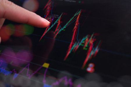stock exchange monitor screen closeup on tablet with businessman finger analysis while open market...