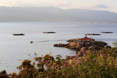 Landscape of beautiful sunset at a lighthouse.の写真素材