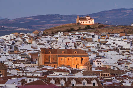 Antequera by Night, MÃ¡laga. World Heritage. Church of San Pedro and Ermita de Veracruz in the background at nightのeditorial素材
