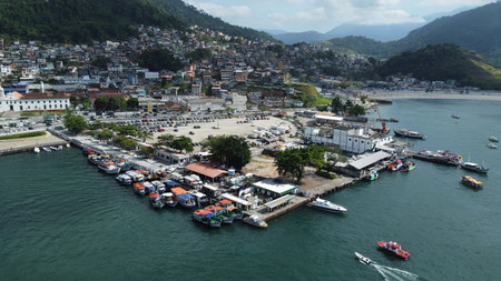 Colorful fishing boats at pier in Angra dos Reis Brazilのeditorial素材