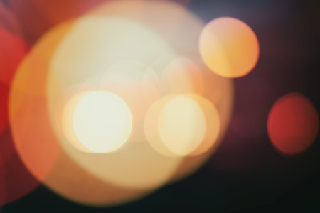 Multicolored defocused lights in the city at nightの写真素材