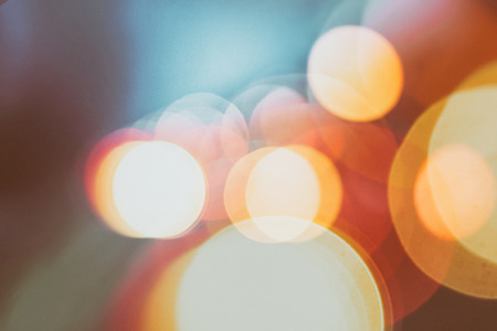 Multicolored defocused lights in the city at nightの写真素材