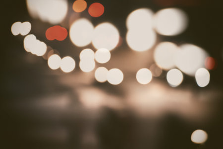 Multicolored defocused lights in the city at night