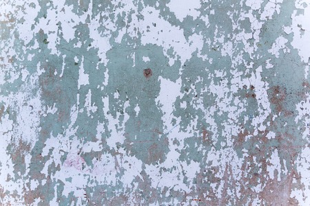 Wall fragment with scratches and cracksの写真素材