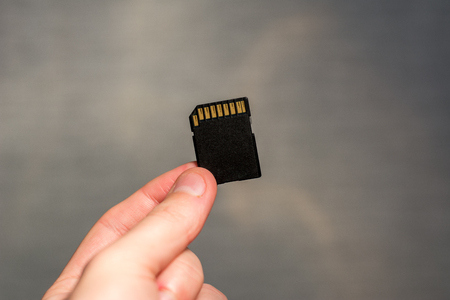 SD Memory Card in handの写真素材