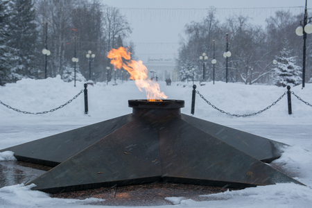 Eternal flame burning in memory of soldiers who died in World War II. Yoshkar-Ola, Russiaの写真素材