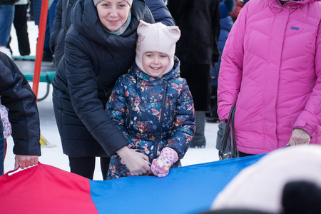Yoshkar-Ola, Russia - February 19, 2018 Smiling people during participation in the Shrovetide gameのeditorial素材