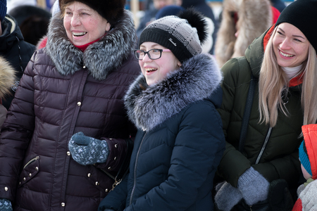 Yoshkar-Ola, Russia - February 19, Russia - Smiling viewers on the Maslenitsa holidayのeditorial素材