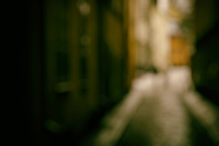 Blurred cityscape background scene. Retro background with stylized filmの写真素材