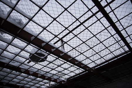 Photo of the grate on top of the place of a walk in prisonの写真素材