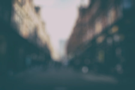 Blurred cityscape background scene. Retro background with stylized film