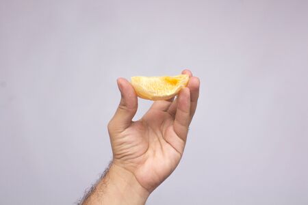 Orange fruit with orange slices and leaves isolated on white background.の写真素材