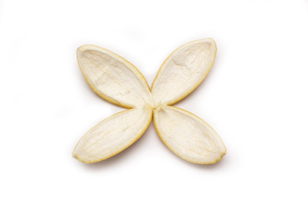 Single orange peel isolated on a white background