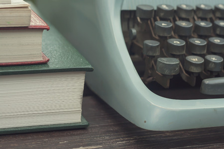 typewriter and book close upの写真素材