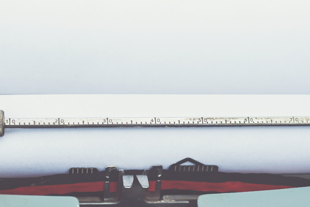 blank paper on a typewiterの写真素材