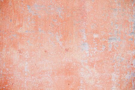 Old pink rusty wall backdropの写真素材