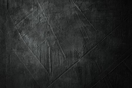 Dark grungy backdrop with textureの写真素材