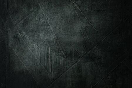 Dark grungy backdrop with textureの写真素材