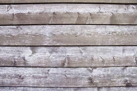 Old wooden logs wall backgroundの写真素材