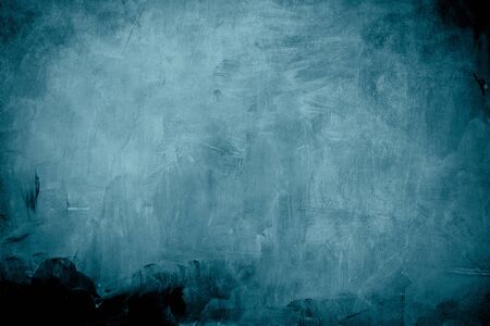Blue grungy backdrop with dark bordersの写真素材