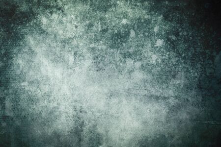 Blue grungy backdrop with dark bordersの写真素材