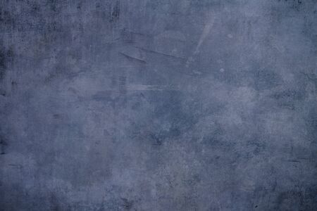 Blue grungy backdrop with textureの写真素材