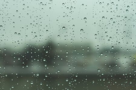 Rain droplets in the windowの写真素材