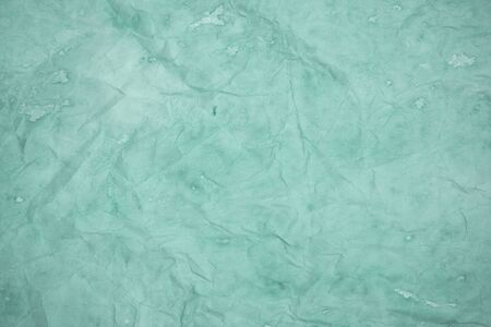 Old crumpled blue paper sheet textureの写真素材