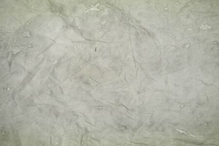 Old creased paper sheet textureの写真素材