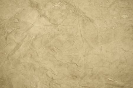 Old creased paper sheet textureの写真素材