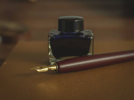 Fountain pen and ink bottleの写真素材