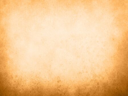 Orange colored old paper with dark vignette bordersの写真素材