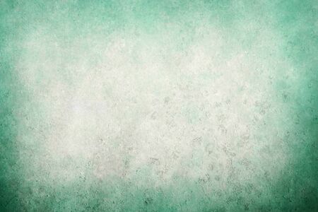 Blue-green old paper with dark vignette bordersの写真素材