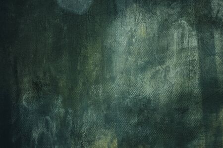 Dark green grungy canvas backdropの写真素材