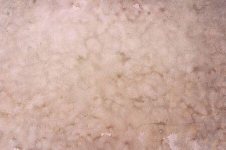 Pink grungy backdrop with dark vignette bordersの写真素材