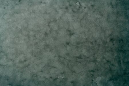 Blue grungy backdrop with dark vignette bordersの写真素材