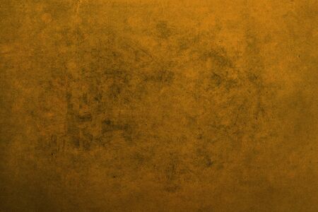 Grungy orange backdrop with textureの写真素材