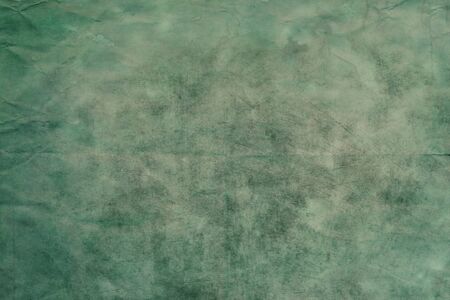 Old blank green paper sheet textureの写真素材