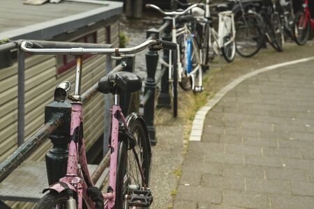 Bikes parked in the streets of Amsterdamの写真素材