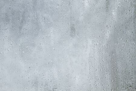 Blue grungy backdrop with textureの写真素材