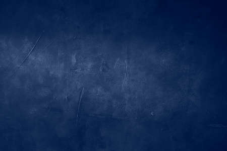 Grungy blue background or texture with dark vignette bordersの写真素材