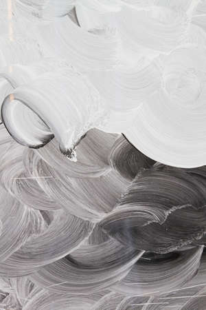 White paint strokes on a shop window glassの写真素材