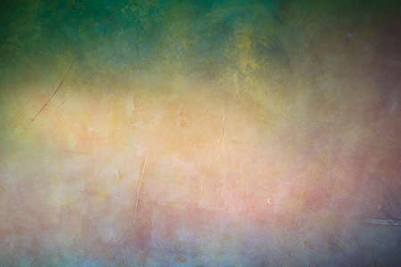 Grungy backdrop with dark vignette borders and texturesの写真素材