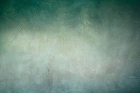 Grungy backdrop with dark vignette borders and texturesの写真素材