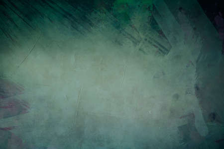 Grungy backdrop with dark vignette borders and texturesの写真素材